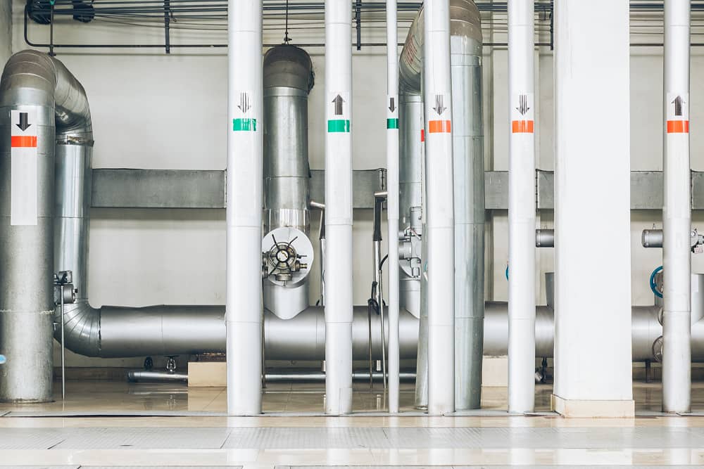 Steel pipes and cables in building infrastructure integrated with Sublime Environmental water treatment systems for optimal performance